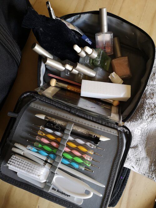 nail technician bag with supplies inside
